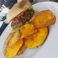 Delicious burger with sweet potato chips at Osteria n.3 in Praia