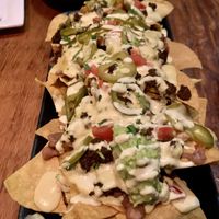 Vida Nachos cashew queso,Vida-chorizo,beans,creama,guacamole❤️ at Vida Cantina SF in San Francisco