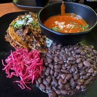 Birria tacos with consomme  at Vida Cantina SF in San Francisco