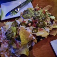 Huge nacho stack to share at Vida Cantina SF in San Francisco