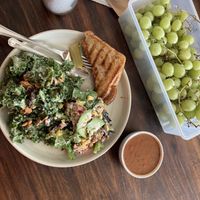 Pizza Pop Panini, Kale Salad, Broken Burrito Bowl, tomato soup.   at Mondays Plant Café in Calgary