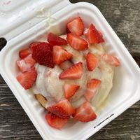 roll with almond frosting and strawberries at Cinnaholic in Berkeley