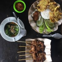 Indonesian food with a vegan twist! Rice with tempura, vegetable soup with mock meat, and mushroom satay with peanut sauce! Also ordered carrot juice and tea. Only cost RP70 000 at Soma Yoga - Vegi Jawi in Depok