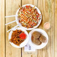 Burger loaded fries, fries, and Mac & cheese balls at The Trashy Vegan in Asheville