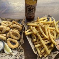 With fries and own brand vegan beer!  at Mad Mad Vegan - Lavapiés in Madrid