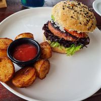 Burger and potatoes at Camu Camu cafe in Playa Del Carmen