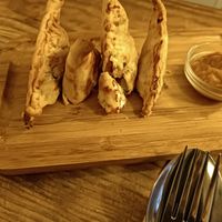 Empanada with sauce at The Green House in Santiago De Compostela