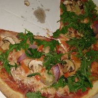 This pizza is supposed to have artichoke and cooked paprika and onion. What a joke. at Pizza Amsterdam in Amsterdam