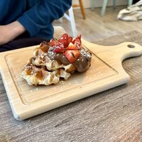 Vegan waffle with vegan Nutella and strawberries   at Love Peace & Coffee in Edinburgh