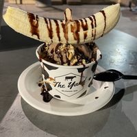 Oat milk ice cream with banana topper, chocolate syrup and peanuts.   at The Yard Milkshake Bar in Phoenix