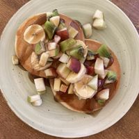 Pancakes with fruits  at Pancake House TLV in Tel Aviv