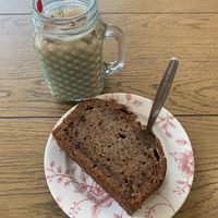 Banana and cinnamon loaf and a vanilla iced latte with oat milk  at Cadbury Garden Centre in Congresbury