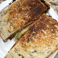 toasted vegan pepperoni, gherkins & vegan mayo sandwich  at Momo's Garden Café in London