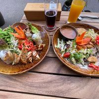 Starter platter for two (left) and noodles with fried tofu (right)   at Quê Ta in Wurzburg