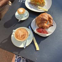 Our breakfast: ‘Greta toast’ & cortado w/ soymilk and vegan croissant & cappucino w/ soymilk  at Duzu Kafe Taberna in Durango