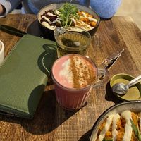 Buddha bowl, green tea and beetroot latte (oat milk)  at Ebike Cafe at Deheers in Weymouth