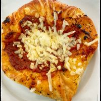 Vegan pizza margarita croissant ❤️❤️❤️❤️❤️ at King of Tarts in Edmonton