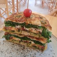 Vegan sandwich with foccacia, vegan mozzarella and pesto at Nibs Healthy Bar in Menorca