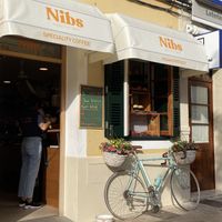 Cafe but best seating is outside!  at Nibs Healthy Bar in Menorca