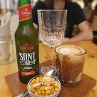 Vegan Nutelino and local beer at Nibs Healthy Bar in Menorca