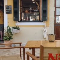 Shop front at Nibs Healthy Bar in Menorca