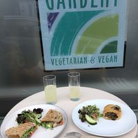 Hummus and Spinach toasted sandwich and a mushroom sausage roll. at The Gardent Reigate in Reigate