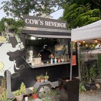 Food truck in a lot of other food trucks  at Cow's Revenge Vegan in Panama City