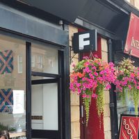 Sign with flower basket at Frankie Coffee in Glasgow