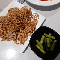 Fried lotus root, pickled asparagus at Woka Woka in Sunnybank
