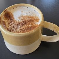 Chris latte with oatmilk at Tarmachan in Ballater