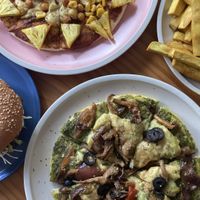 Pesto pizza and hawaiian bbq pizza  at iVegan Supershop Da Nang - Healthy Plant Based Cafe in Da Nang