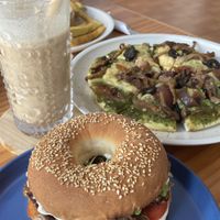 Best combo! Coconut coffee, pesto pizza and tempeh bagel😍  at iVegan Supershop Da Nang - Healthy Plant Based Cafe in Da Nang