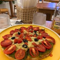 pesto pizza with cheese made by cashew at iVegan Supershop Da Nang - Healthy Plant Based Cafe in Da Nang