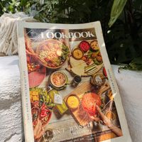 Magazine-style menu  at iVegan Supershop Da Nang - Healthy Plant Based Cafe in Da Nang