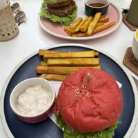 Green: beyond meat burger, red: meat burger (but with bean patty)  at iVegan Supershop Da Nang - Healthy Plant Based Cafe in Da Nang