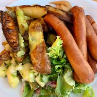 Vegan sausages & potato wedges, potato salad. (Lunch buffet) at Café Ursula in Helsinki