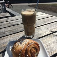 Oat latte & cinnamon bun. at Café Ursula in Helsinki