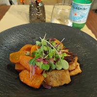 Marinated sautéed in-house seitan with roasted sweet potato and carrot at Ca n'Ela Vegan Restaurant in Mallorca