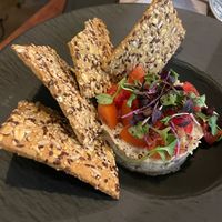 Smoked aubergine tartare with seedy crackers at Ca n'Ela Vegan Restaurant in Mallorca