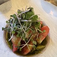 Tomato salad with basil cashew cheese    at Ca n'Ela Vegan Restaurant in Mallorca