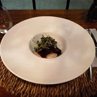 Ravioli crudo de remolacha con queso de hierbas (salteado de nueces y alcaparras)  at Ca n'Ela Vegan Restaurant in Mallorca