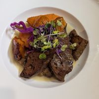 Seitan “steak” in a lemon sauce with sweet potatoes   at Ca n'Ela Vegan Restaurant in Mallorca