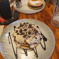 (Top) ORIGINAL PANCAKES
(Ve)
with maple syrup and butter. (Bottom) CHOCOHOLIC PANCAKES. at Nomas in Macclesfield