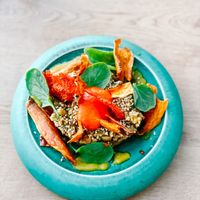 Some kind of vegetable burger with baked potato slices.  at Yaya‘s in Mallorca
