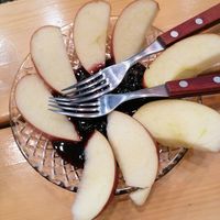 Complimentary 'spoon dessert' - apple with homemade sour cherry jam at Pheidias Grill House in Olympia