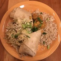 A good plate of samosa wrap with mango chutney, cabbage, and brown rice. Very filling! at Moosewood Restaurant in Ithaca