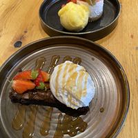 Brownie with coconut-vanilla ice cream // slice with mango sorbet (gluten-free)  at The Tal-y-Cafn in Colwyn Bay