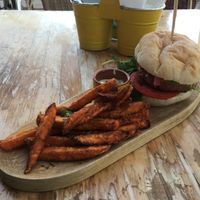 Veggie burger with sweet potato fried (probably not vegan tho) at MaiMai Surf Bar in Mallorca