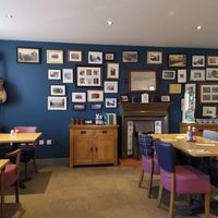 Lovely interior I feel, can't go wrong with a guitar. at The Swan in Banton