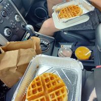 Vegan waffle, strawberry juice, orange juice at Charlie Waffles & Co in Dundee